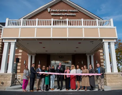 ribbon cutting 128